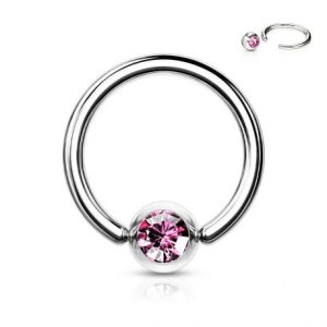 Piercing anneau captif en strass rose