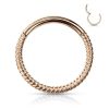 Surgical steel clip-on segment ring with rose gold braided design